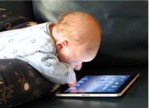 image of baby with ipad from http://proservicescorp.com/wp-content/uploads/ipad_baby.jpg 